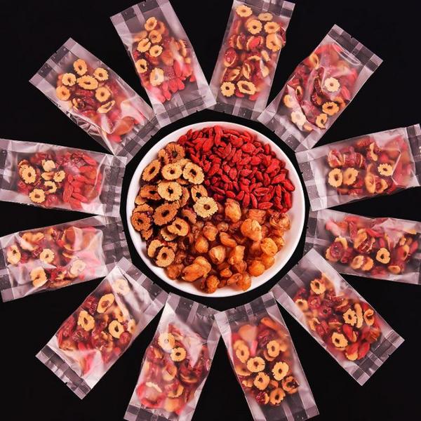 定制全自動化堅果什錦水果葡萄干膨化食品給袋式多功能包裝機設(shè)備